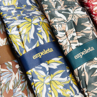 5: Different colors of floral print umbrellas.
