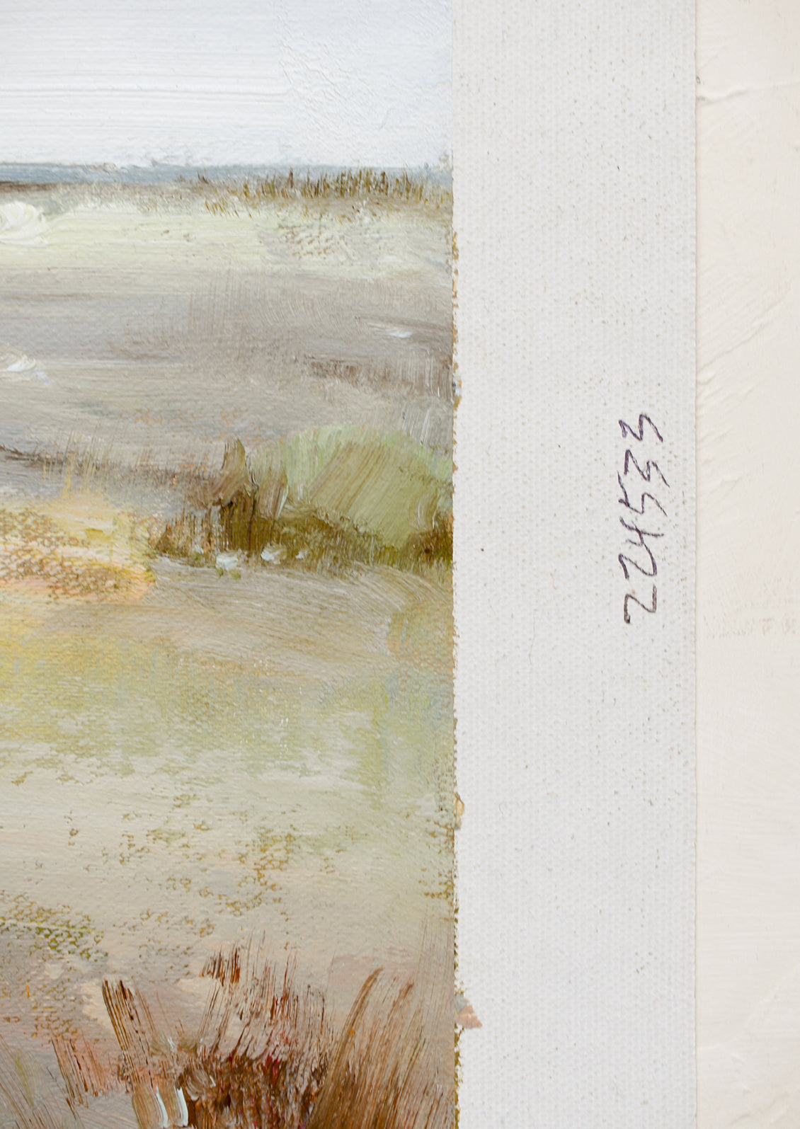 An oil painting of a tree by a marsh, in pastel hues.