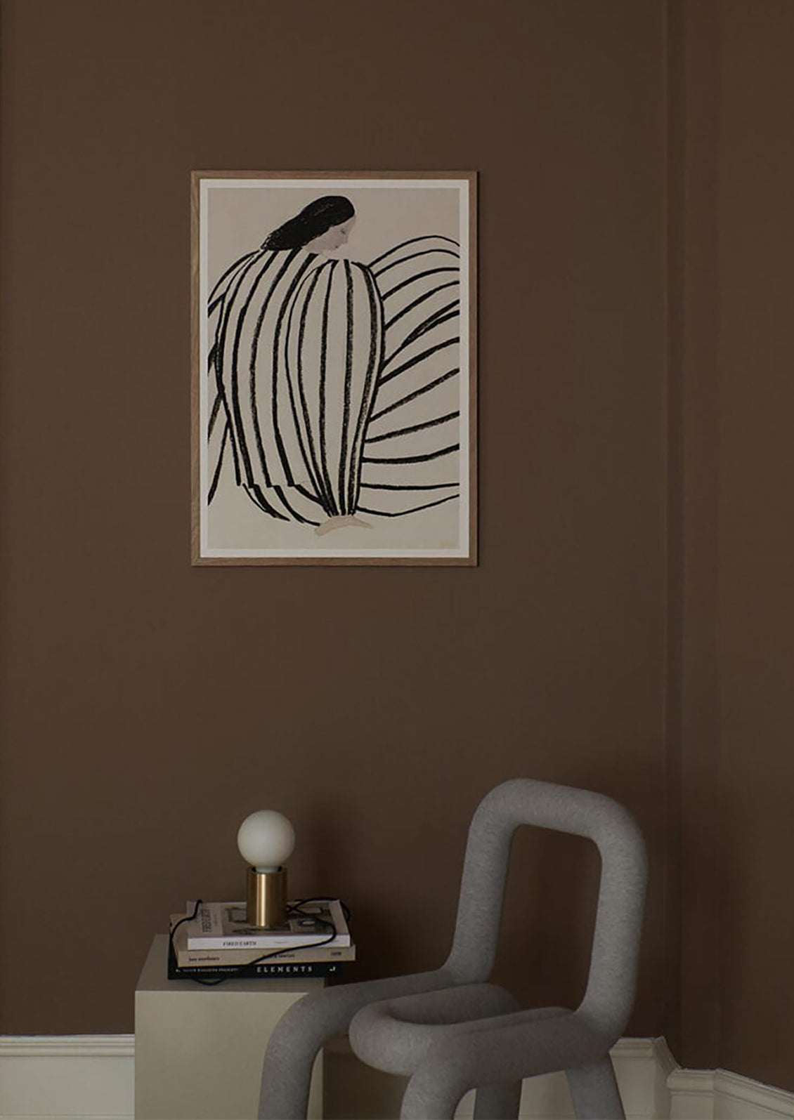 A figural art print of a woman wearing a black and white striped outfit.