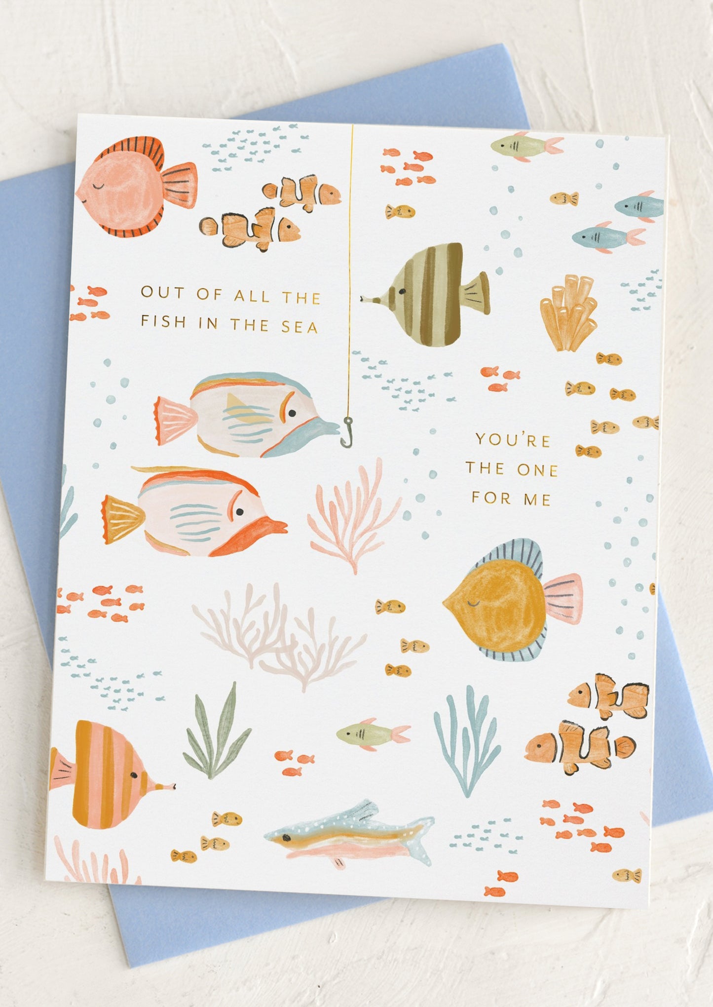 A fish print card reading "Out of all the fish in the sea you're the one for me".