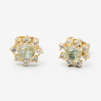 1: A pair of aquamarine and clear crystal gold stud earrings in sun shape.