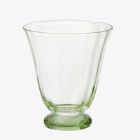 Recycled Green: A footed water glass in recycled green tint.