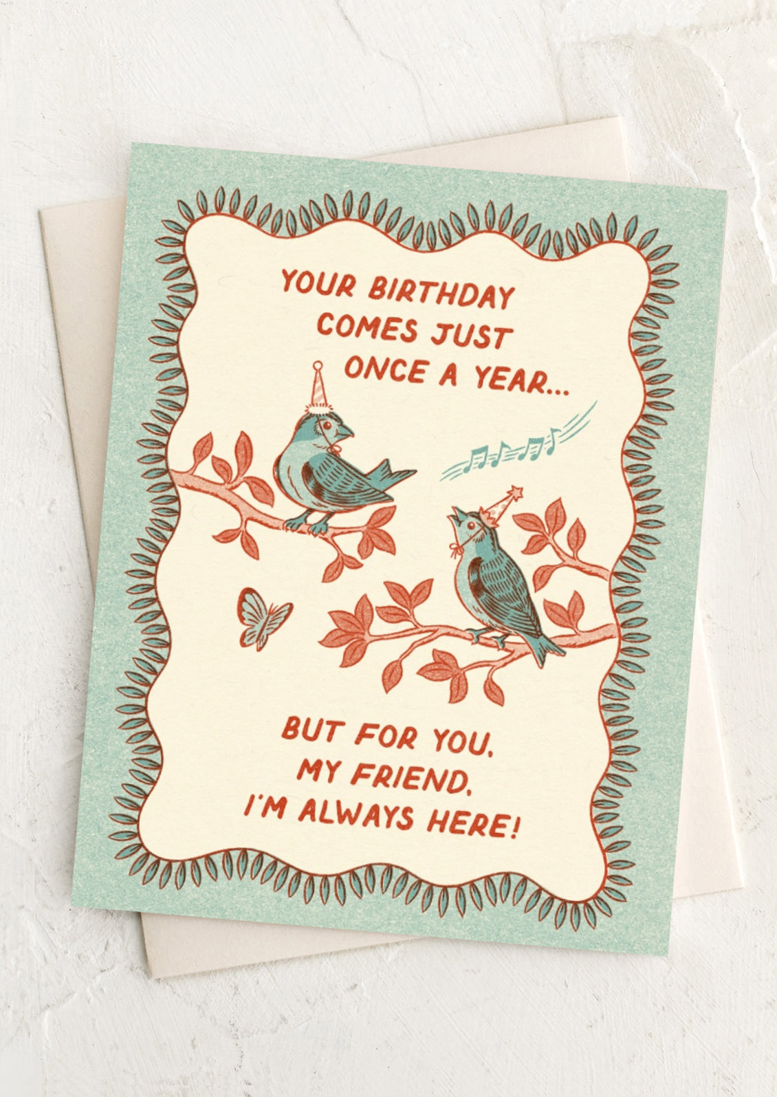 Birthday card with birds on a branch and text on a light background
