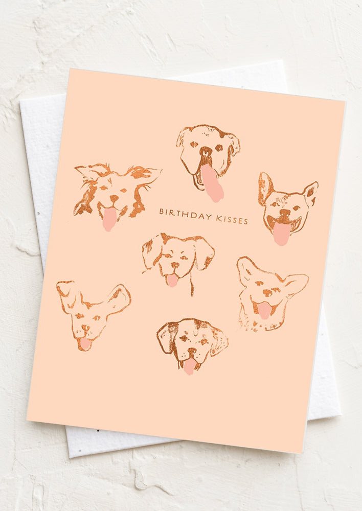 1: A card with dog faces reading "Birthday kisses".