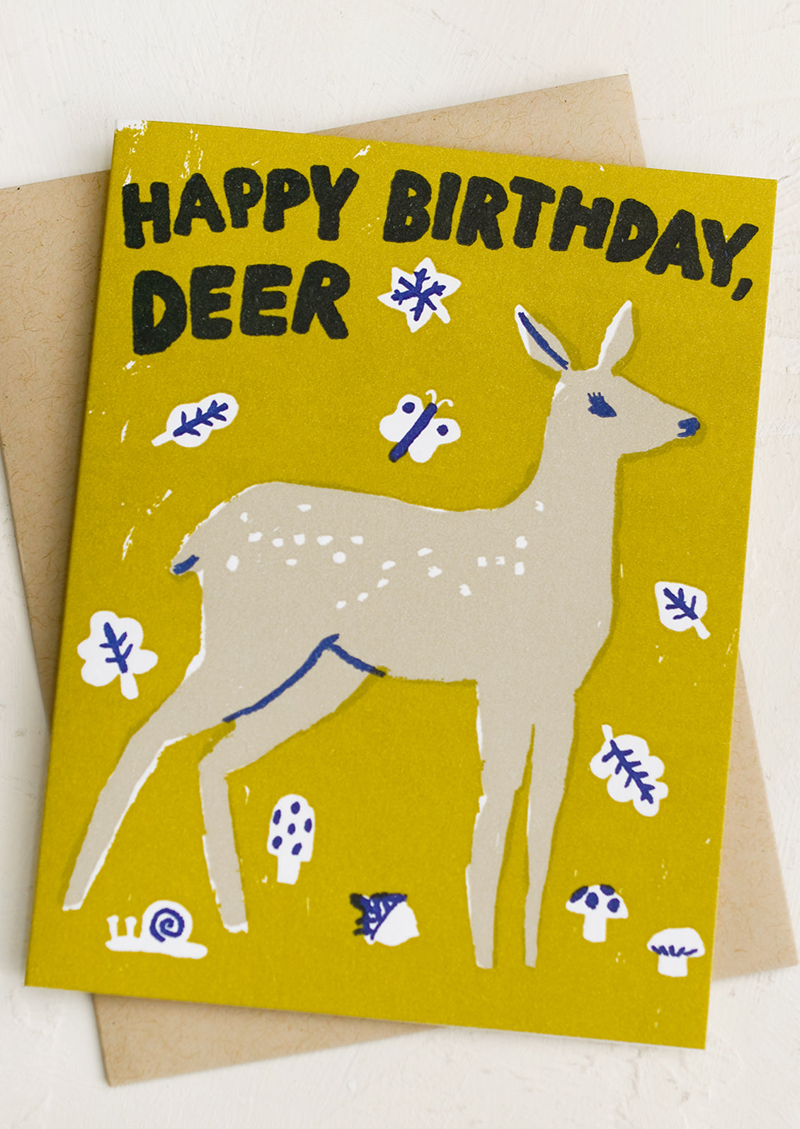 A card with illustration of deer, text reads "Happy Birthday, Deer".