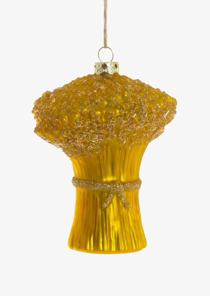 1: A glass ornament of a golden bushel of wheat.