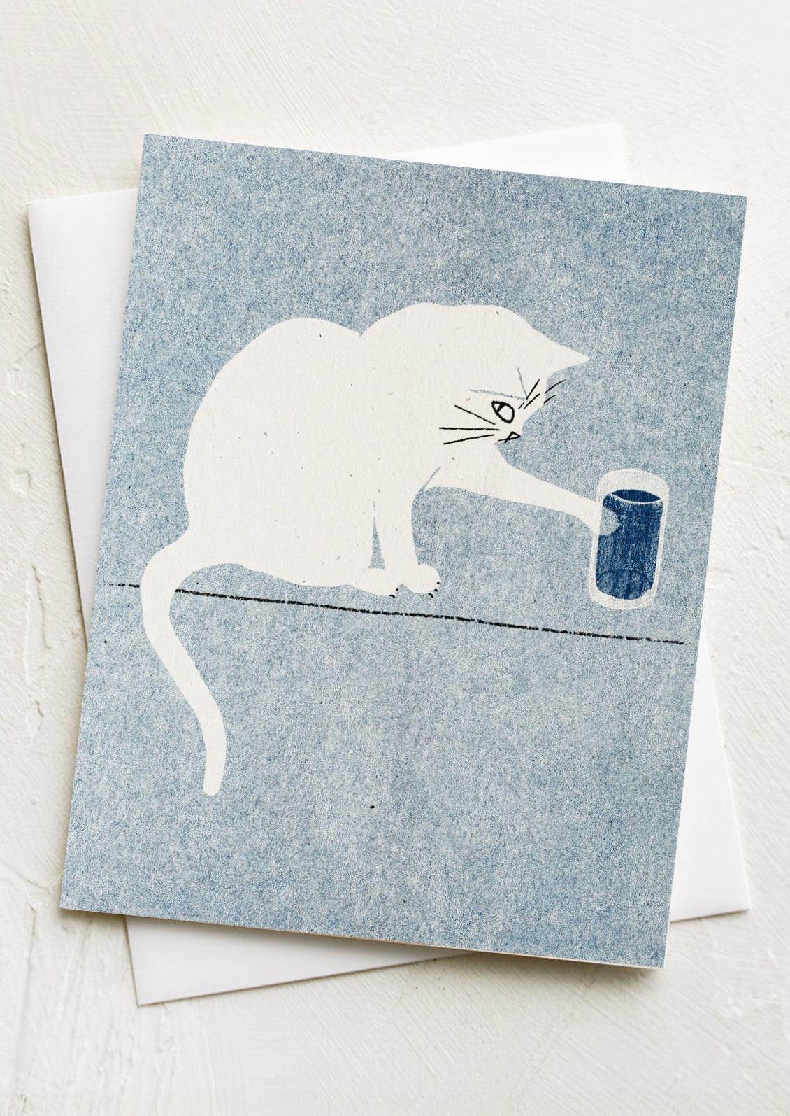 A card with image of cat touching glass of water.