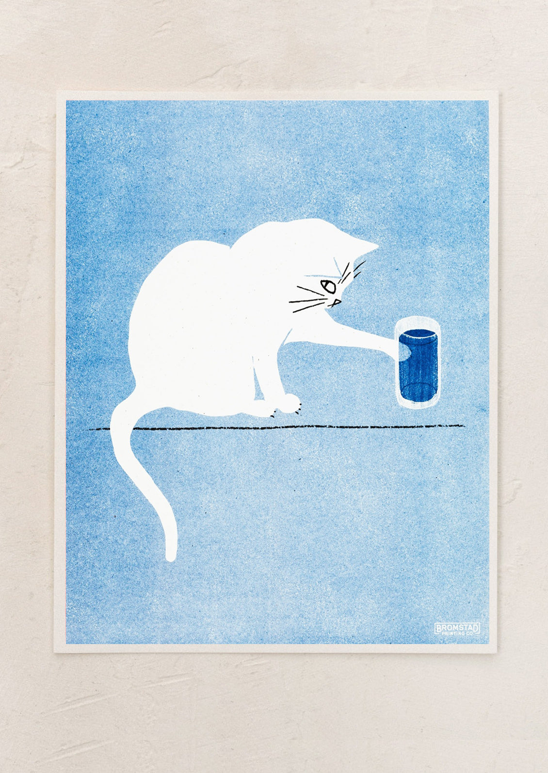 A risograph art print depicting a white cat with water glass atop blue background.