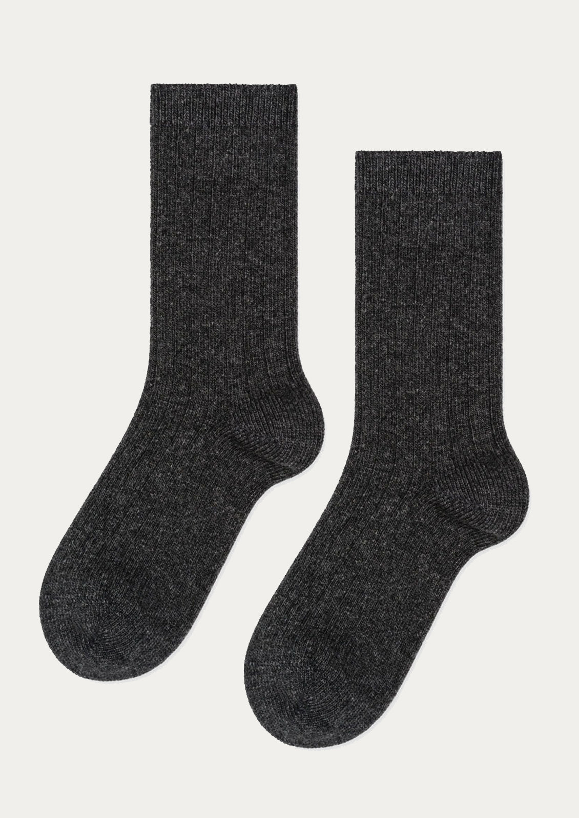 A pair of ribbed cashmere socks in charcoal.