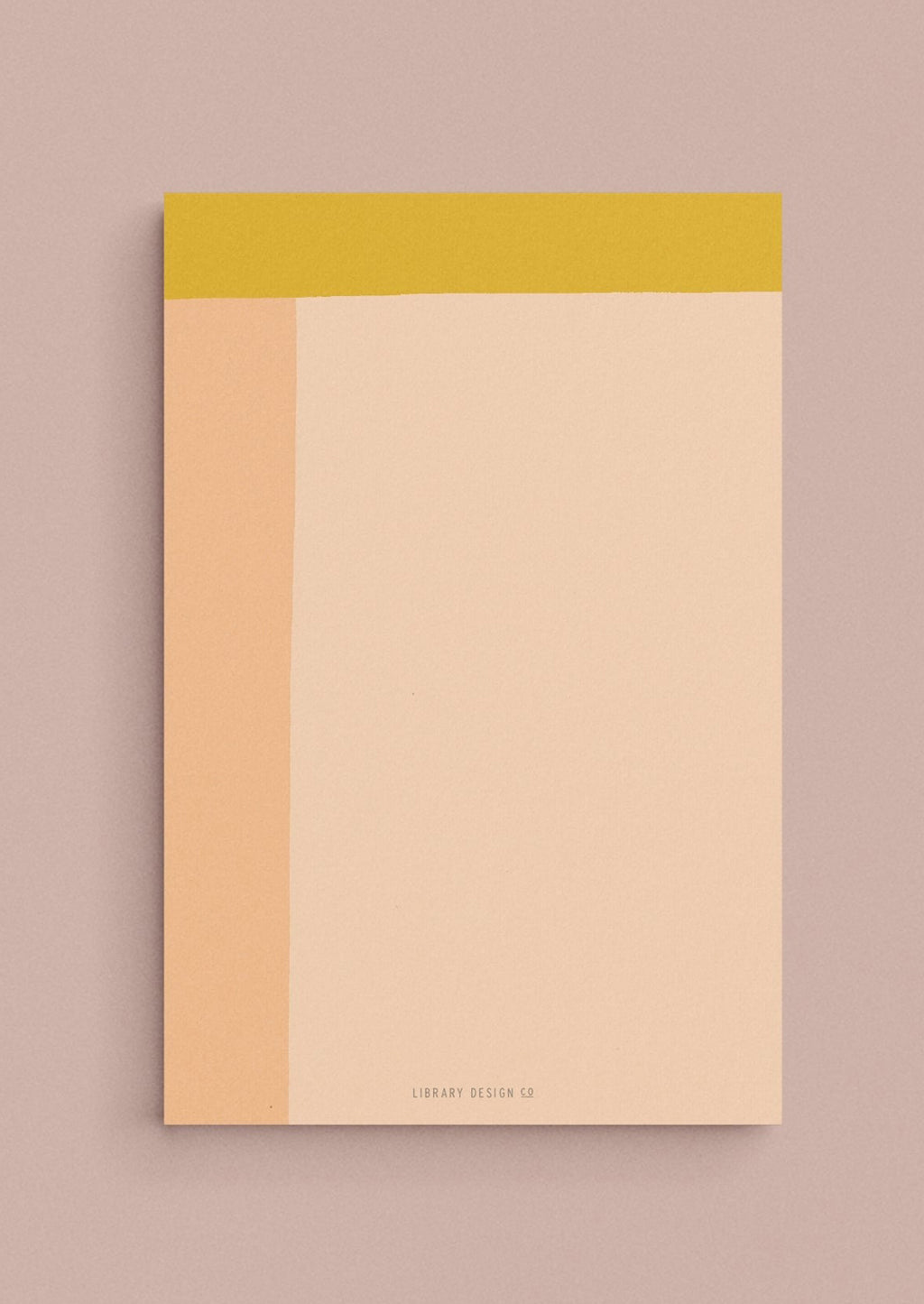 Peach Multi: A colorblock notepad in peach and yellow.