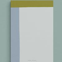 Periwinkle Multi: A colorblock notepad in periwinkle and olive.