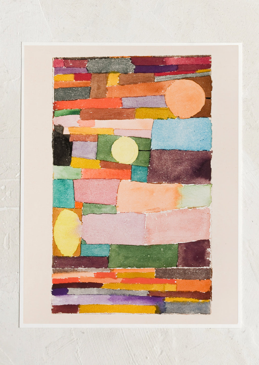 1: An art print of colorful abstract shapes stacked together.
