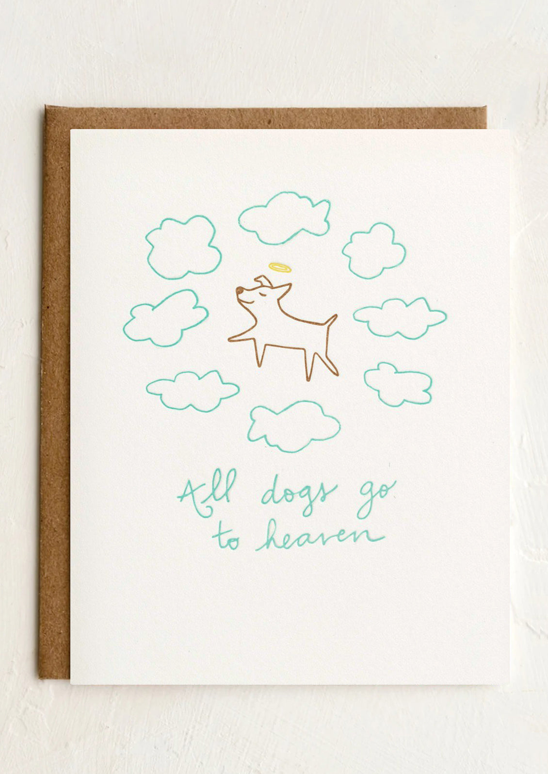 A card reading "All dogs go to heaven".
