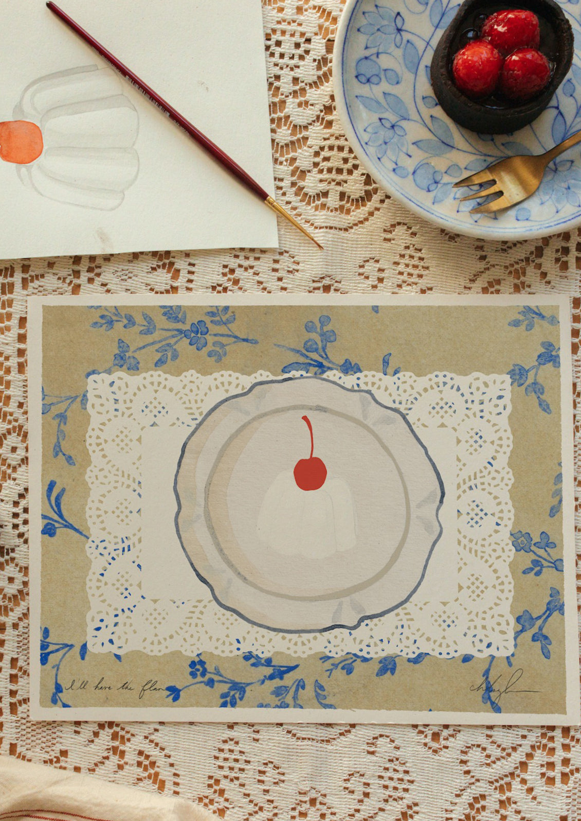 An art print of an illustration of flan on a plate and doily, with blue floral background.