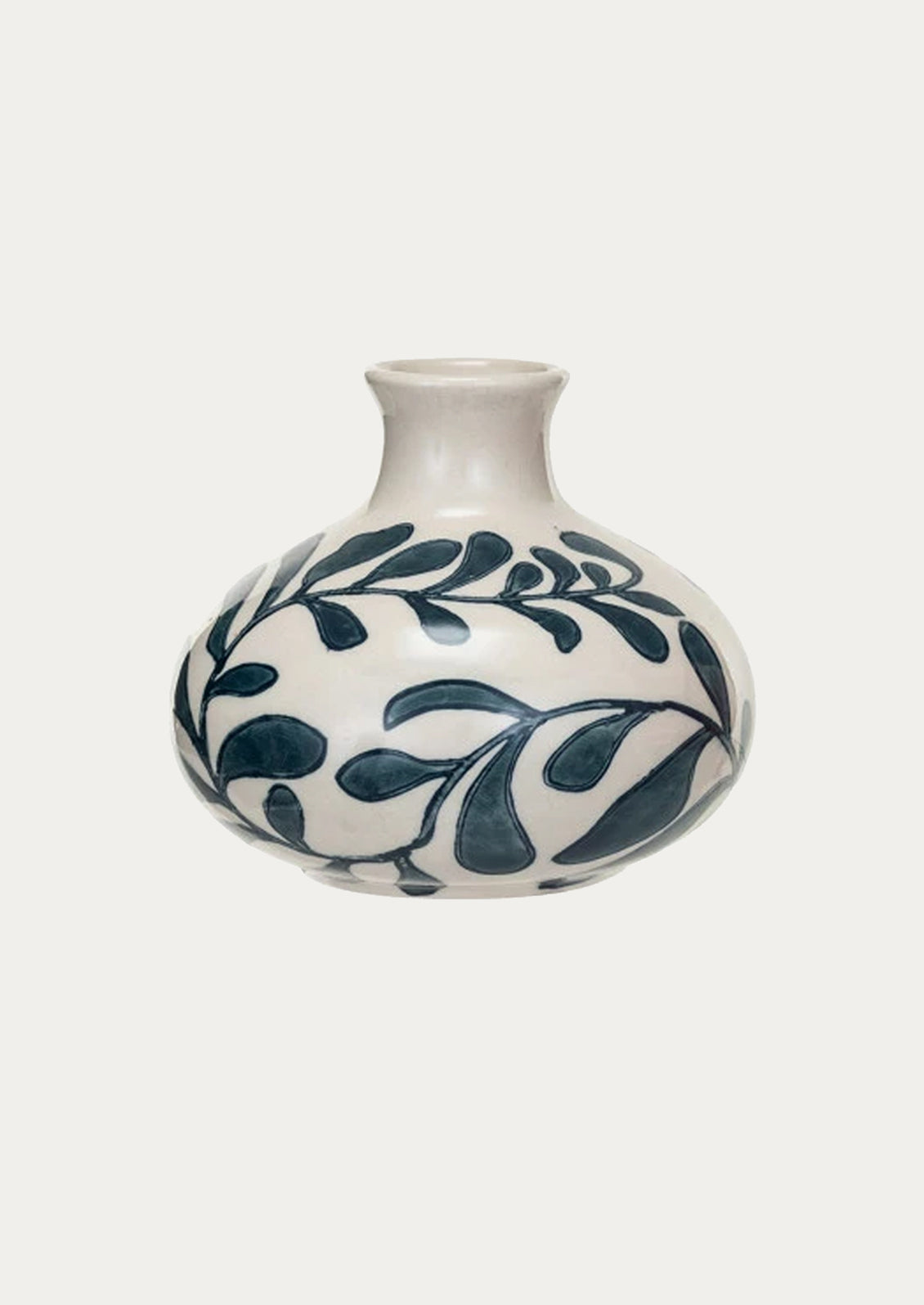 A vase in white with navy blue seaweed/leaf pattern.