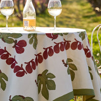 4: A block printed tablecloth with fig fruit and leaf pattern.