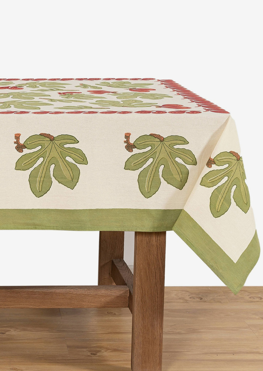3: A block printed tablecloth with fig fruit and leaf pattern.