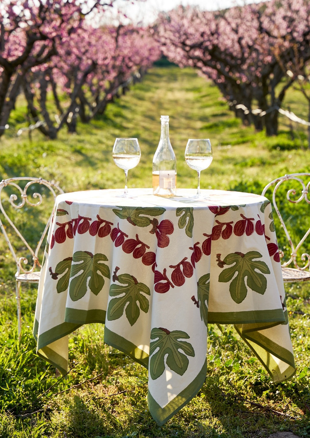 2: A block printed tablecloth with fig fruit and leaf pattern.