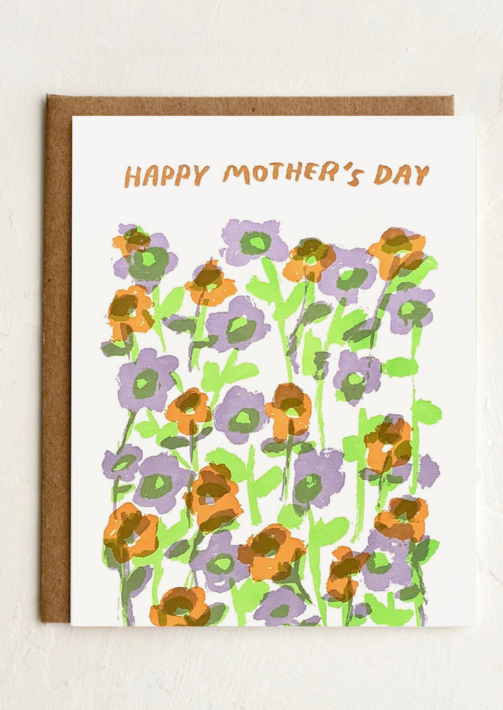 1: A card with floral print reading "Happy Mother's Day".