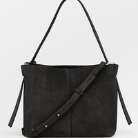Black: A suede handbag in black.