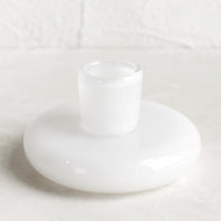 Cotton: A glass taper candle holder in cotton.