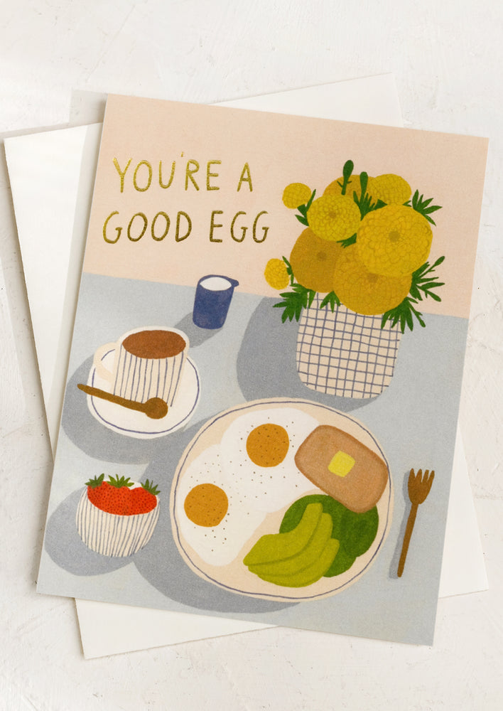 1: A card with breakfast scene reading "You're a good egg".