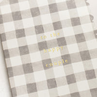 2: A scalloped edge card with grey gingham pattern reading "To the happy couple".