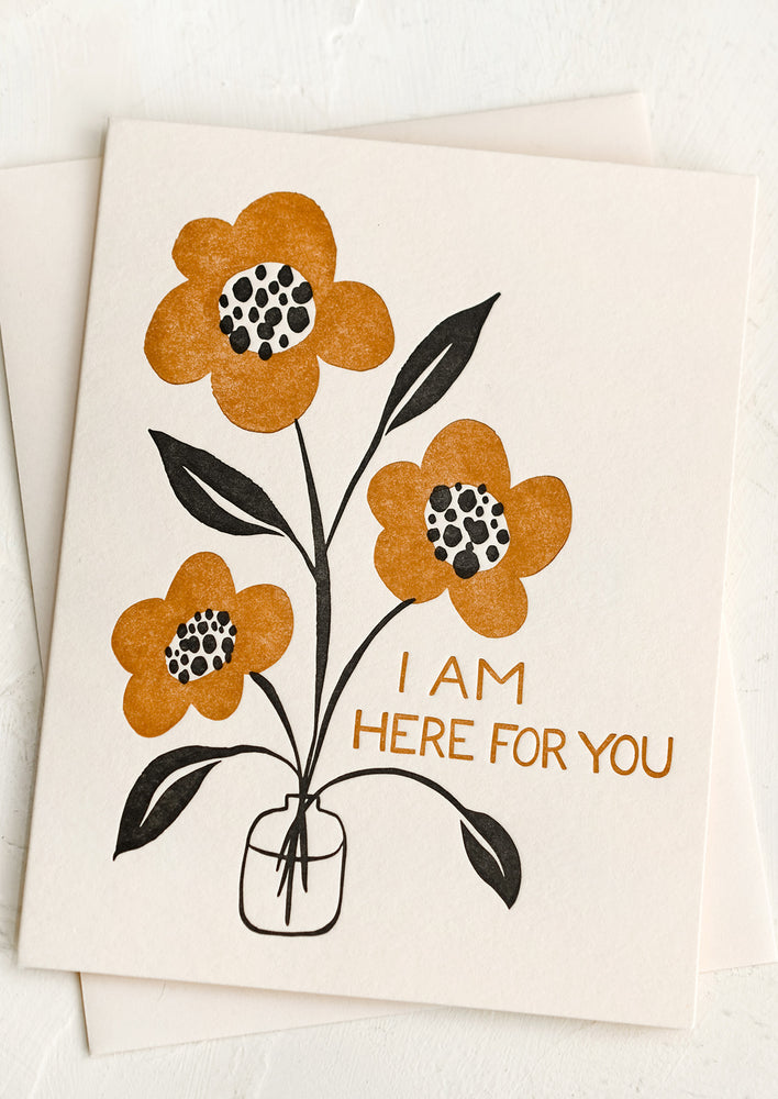 1: A floral print card reading "I am here for you".