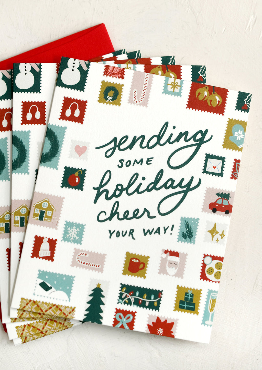 3: A holiday card set reading "Sending some holiday cheer your way!".