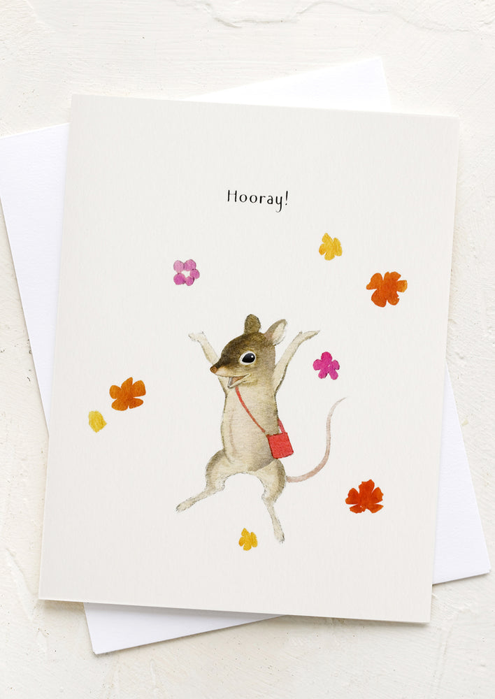 A greeting card with illustration of mouse throwing petals, text reads "hooray".