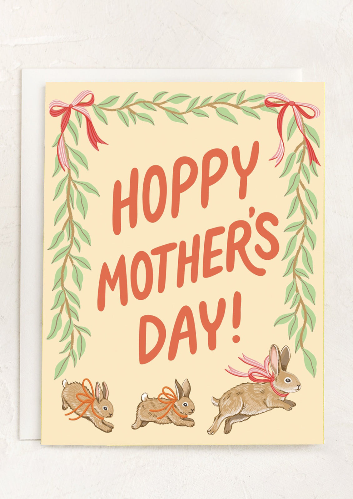A bunny print card, text reads "Hoppy Mother's Day!".