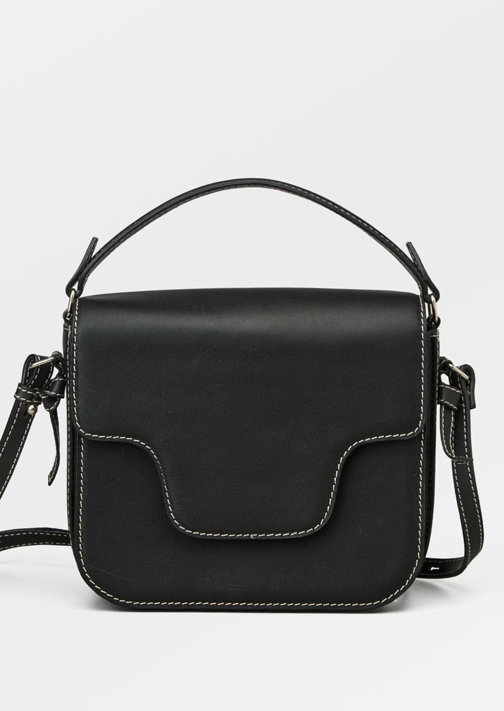 Black: A leather handbag in black with white contrast stitching and flap front design.