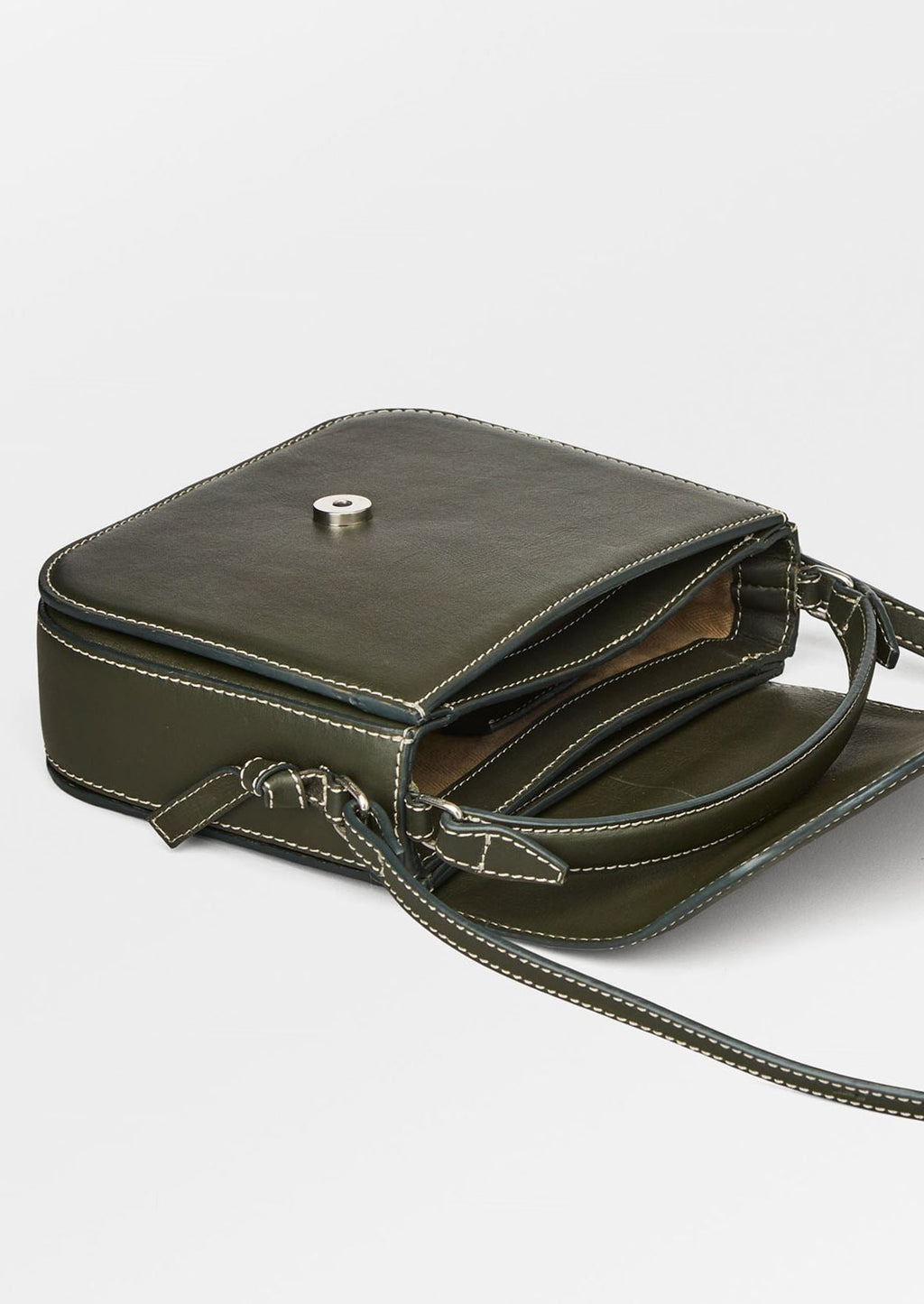 3: A leather handbag in khaki green with white contrast stitching and flap front design.