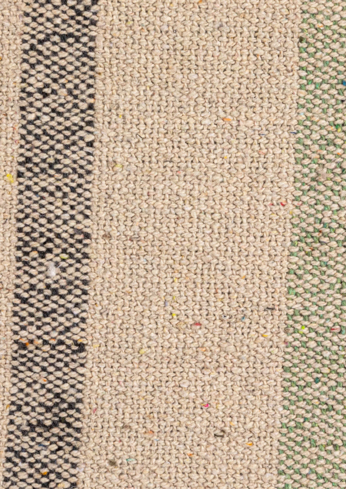 A cotton throw blanket with madras check pattern in shades of pink.