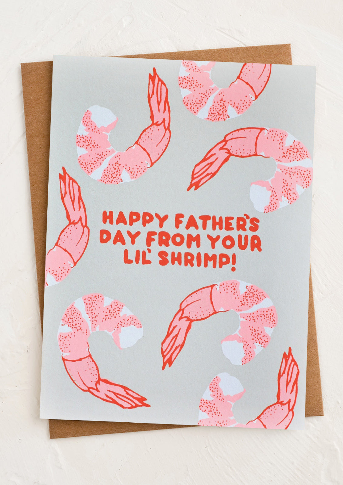 A shrimp print greeting card, text reads "Happy Father's Day From Your Lil' Shrimp!".
