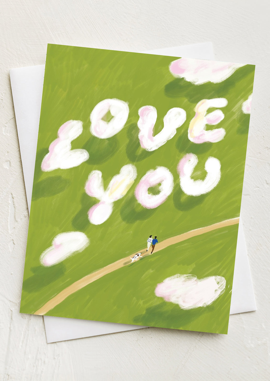 A card with image of clouds forming the words "Love you".