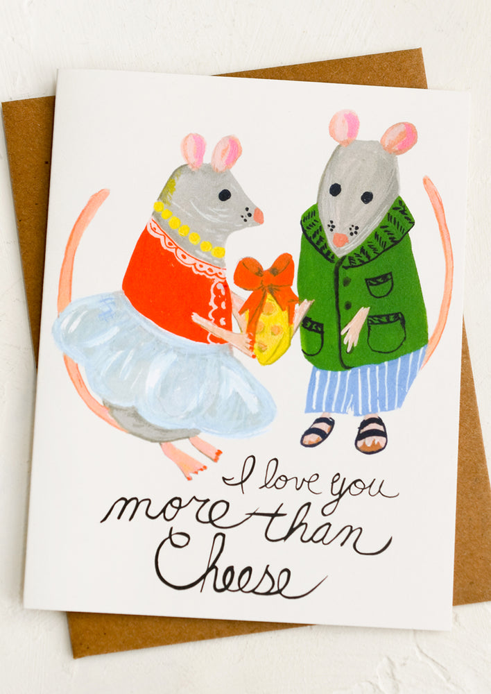 1: A card with illustration of two mice, text reads "I love you more than cheese".