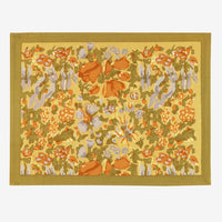 1: A mustard floral print placemat.