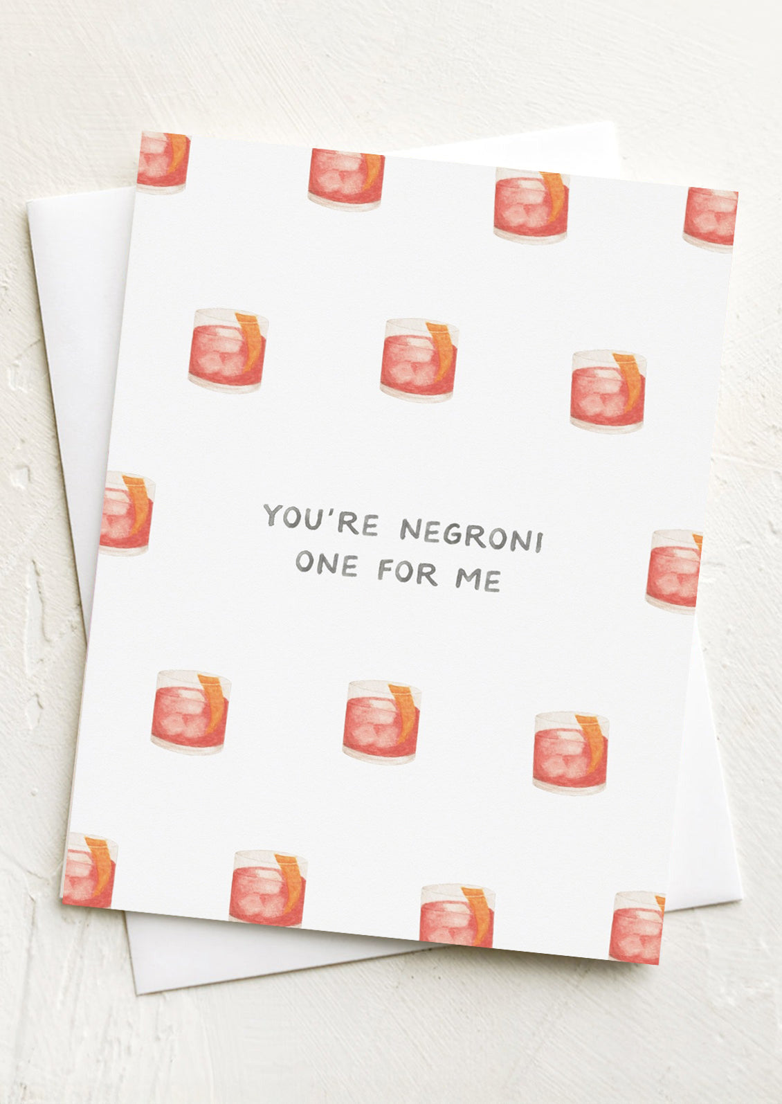Greeting card with negroni glass pattern and text 'You're Negroni One for Me'.