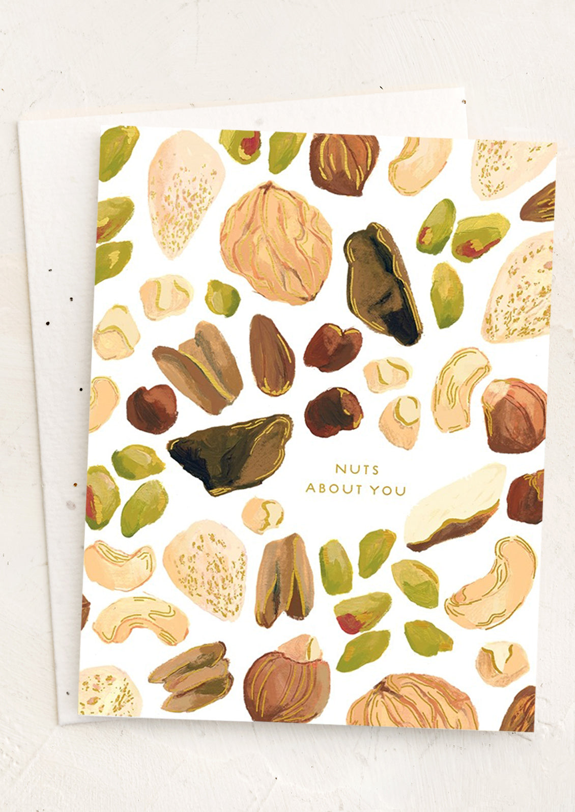 A nut illustrated card reading "Nuts about you".