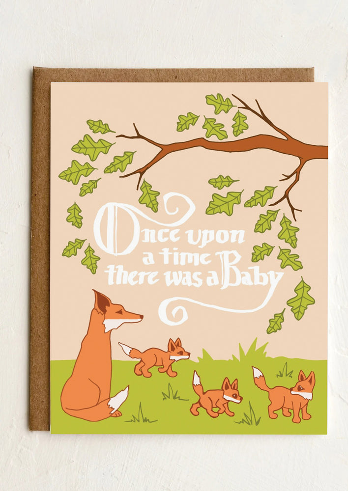 A fox print card reading "once upon a time there was a baby".