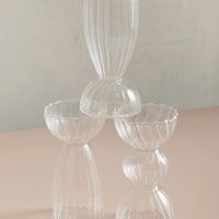 1: Optic glass bud vases in three different styles.