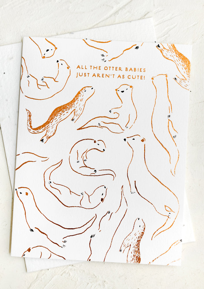 An otter print card reading "All the otter babies just aren't as cute!".