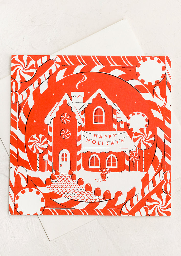 A square card with image of peppermint candy house.