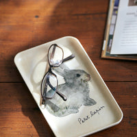 2: A rectangular tray with illustration of grey bunny.