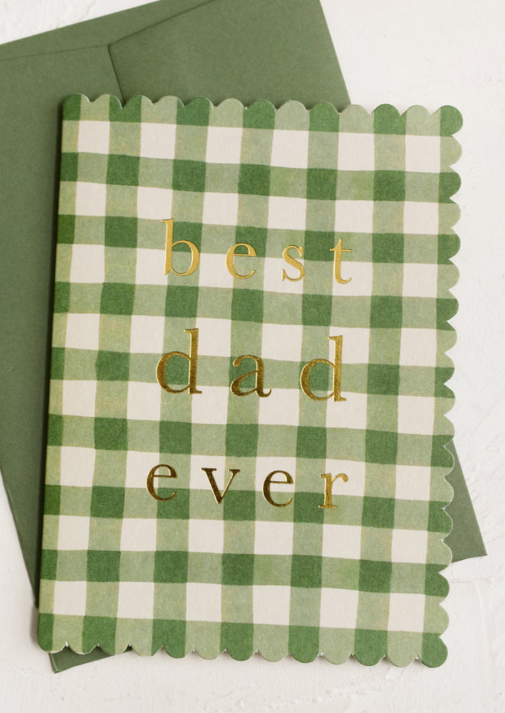 1: A green plaid print father's day card.