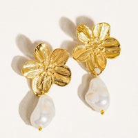 1: A pair of earrings with flower shaped post and dangling pearl bead.