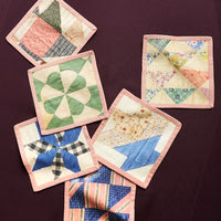 3: A set of quilt printed square cocktail napkins in 6 different patterns.