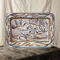 3: A rectangular ceramic platter with quail and nature pattern in brown.