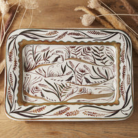 1: A rectangular ceramic platter with quail and nature pattern in brown.